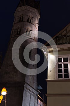 citylights at night with facades and architecture of a marketplace