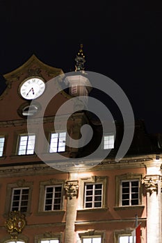 citylights at night with facades and architecture of a marketplace