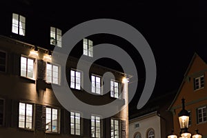 citylights at night with facades and architecture of a marketplace