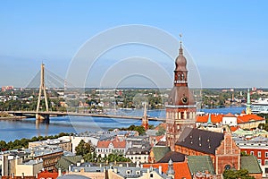 Cityscape aerial view on the old town with Dome cathedral and Vansu bridge through Daugava river in Riga city, Latvia