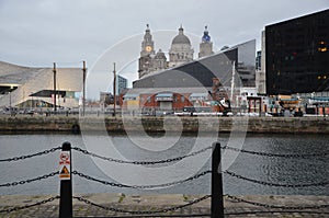 cityscape and albert docks by night in liverpool