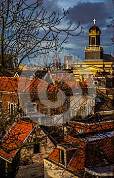 Cityscape of Amsterdam, old type buildings and channels