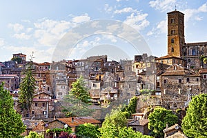 Cityscape of the ancient village of Sutri and the bell tower of
