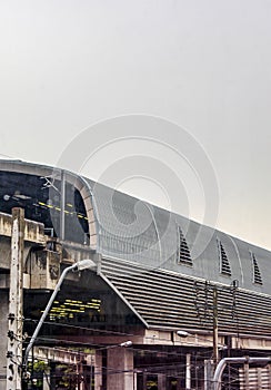 Cityscape architecture and rain at Makkasan station in Bangkok Thailand