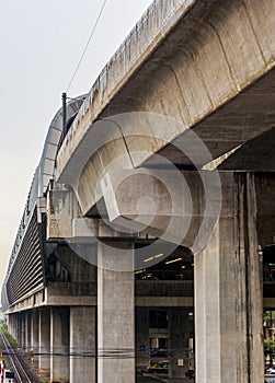 Cityscape architecture and rain at Makkasan station in Bangkok Thailand