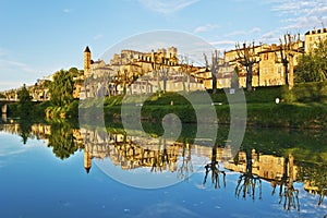 Cityscape of Auch reflecting in Gers River