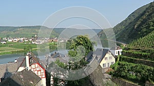 Cityscape of Beilstein at Moselle river. Boats on riving