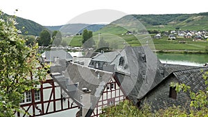 Cityscape of Beilstein village at Moselle river Germany. surrounded by vineyards and forest.