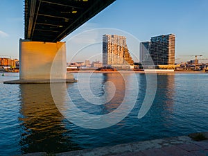 Cityscape of Belgrade under the Old Sava bridge at twilight