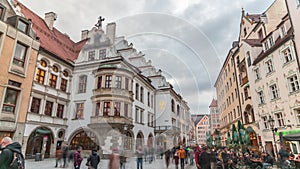 Cityscape with bier houses and restaurants outdoors on Platzl timelapse in Munich, Bayern, Germany.