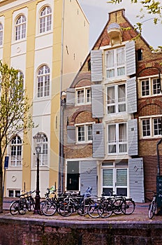 Cityscape with bikes and beautiful house in Amsterdam