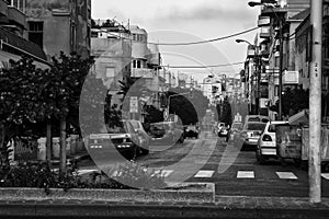 Cityscape in black and white of Ha Rav Kook Street Tel-Aviv Israel photo