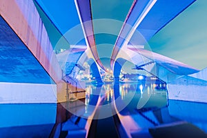 Cityscape of a bridge at night