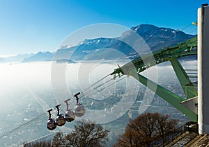 Cityscape with cable cars in Grenoble in autumn, France