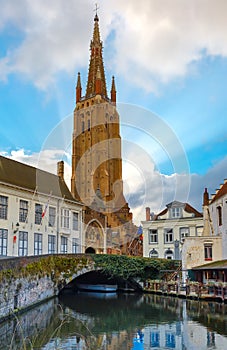 Cityscape with canal Dijver and a Church of Our