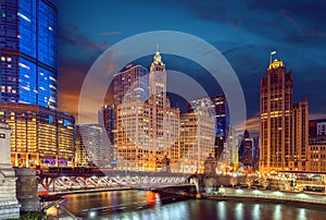 Cityscape of Chicago Riverwalk at Dusable bridge over Michigan rive