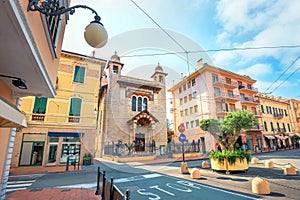 Cityscape with church in Bordighera town. Italian riviera, Liguria, Italy