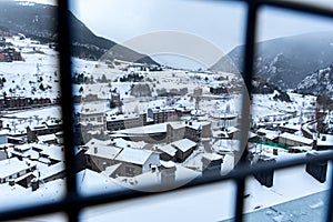 Cityscape in the city of Canillo in Andorra, it dawns with a great snowfall.