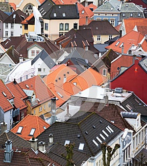 Cityscape with colorful traditional houses, roofs from terracotta tiles. Bergen
