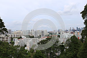 Cityscape of Condominium building complex with Warehouse import-export and Green forest park in singapore, City area