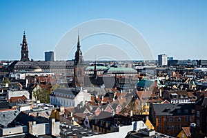 cityscape of Copenhagen with spire of City