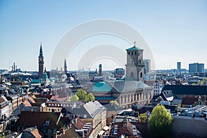 cityscape of Copenhagen with spire of City