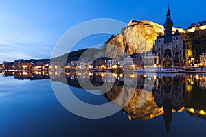 Cityscape Dinant at night along the river Meuse, Belgium