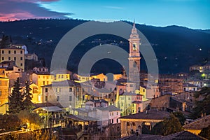 Cityscape of Dolcedo at dusk - small town in Ligurian Alps, Italy photo