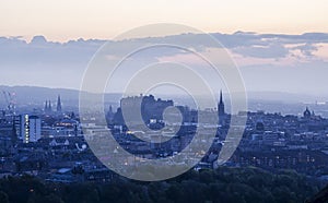 Cityscape at Dusk with Castle photo