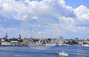 Cityscape of embankment In Old Town Gamla Stan in summer day. Stockholm, Sweden