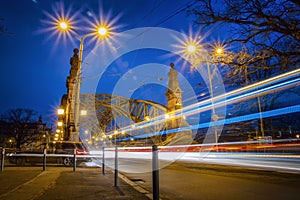 Cityscape - evening view on bridge with lights moving vehicles, the Zwierzyniecki Bridge eastern part of Wroclaw