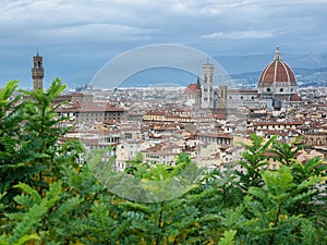 Cityscape of Florence old city seen from piazzale Michelangelo - Santa Maria del Fiore cathedral, Palazzo Veccio, cloudy day