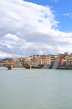 Cityscape of Florence, Tuscany, Italy. Historical center located along the Arno river. Blue sky and clouds over the Italian city.