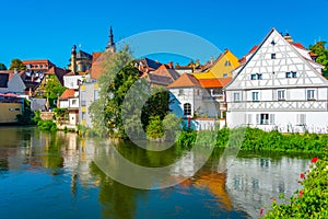 Cityscape of German city Bamberg reflecting on river Regnitz