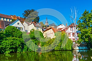 Cityscape of German city Bamberg reflecting on river Regnitz