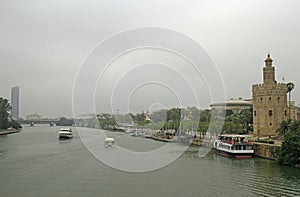 The cityscape with Guadalquivir river in Seville,