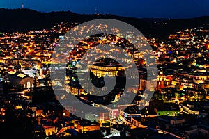 Cityscape of Guanajuato city with the Basilica of Our Lady of Guanajuato, Mexico at night