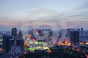 Cityscape of Hanoi skyline in Cau Giay district by Cau Giay park during sunset time in Hanoi city, Vietnam