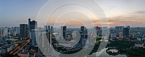 Cityscape of Hanoi skyline at Cau Giay park during sunset time in Hanoi city, Vietnam