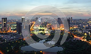 Cityscape of Hanoi skyline at Cau Giay park during sunset time in Hanoi city, Vietnam