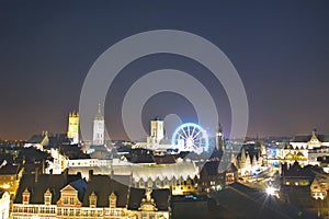 Cityscape of the historic city of Ghent and Roue de paris ferry wheel in Ghent, Christmas