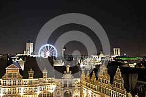 Cityscape of the historic city of Ghent and Roue de paris ferry wheel in Ghent, Christmas
