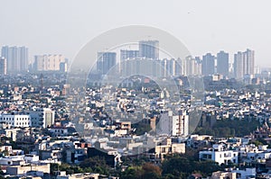 Cityscape with houses, offices and sky scrapers in noida delhi photo