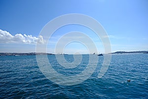 Cityscape of Istanbul and ferries on the Bopshorus