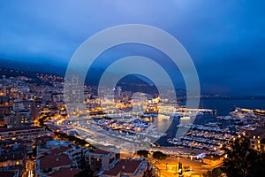 Cityscape of La Condamine at night, Monaco. Principality of Mona