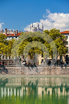 Cityscape of Lyon, France with reflections in the water