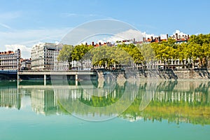 Cityscape of Lyon, France with reflections in the water