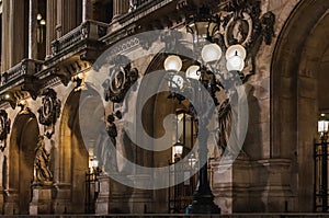 Cityscape of the majestic facade of the Opera Garnier by night in Paris