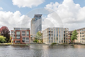 Cityscape of modern apartment buildings at the river `het Spaarne` in Haarlem