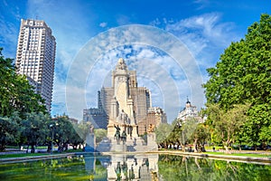 Cityscape with monument to Cervantes on Plaza de Espana. Madrid, Spain